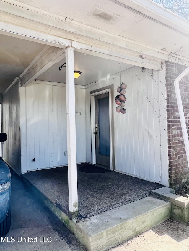116 E Tate St, Senatobia, MS 38668 - property entrance featuring visible vents