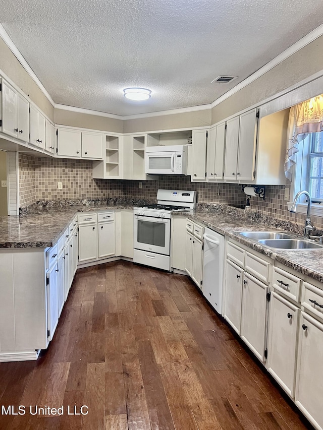 116 E Tate St, Senatobia, MS 38668 - kitchen featuring crown molding, white appliances, a sink, open shelves, and dark wood-style floors