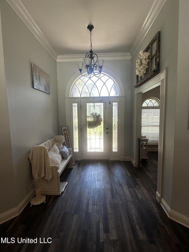 17931 Rayford Shumock Rd, Moss Point, MS 39562 - entryway with healthy amount of natural light, dark wood-style flooring, a chandelier, and crown molding