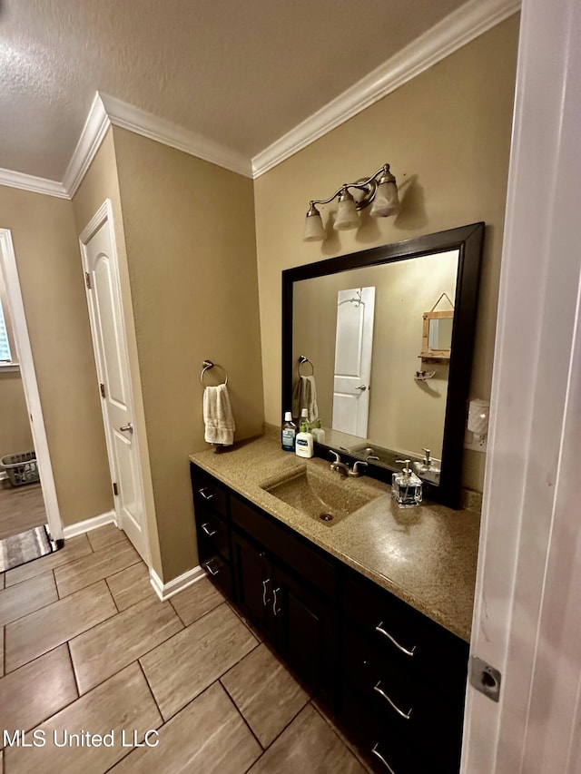 17931 Rayford Shumock Rd, Moss Point, MS 39562 - bathroom featuring ornamental molding, vanity, and wood finish floors