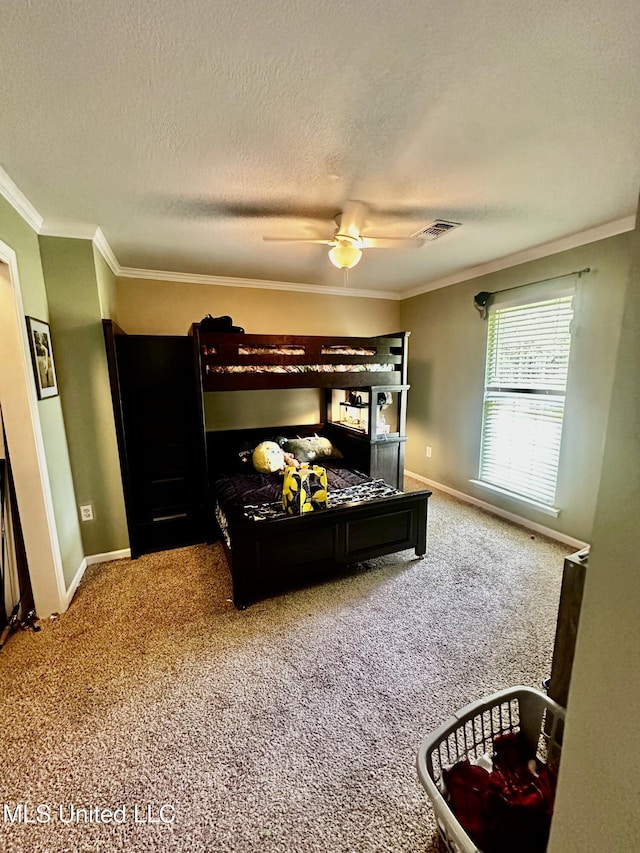 17931 Rayford Shumock Rd, Moss Point, MS 39562 - carpeted bedroom with a textured ceiling, ornamental molding, and a ceiling fan