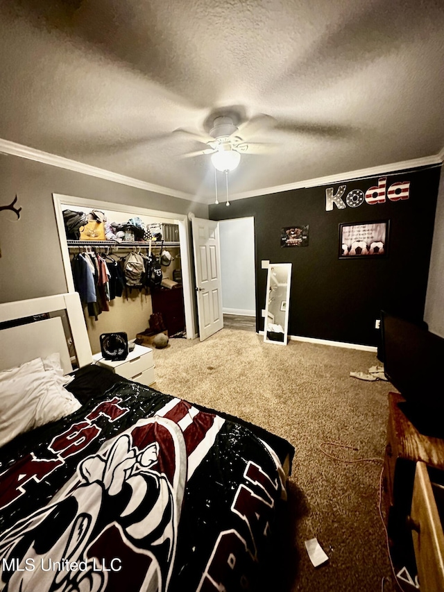 17931 Rayford Shumock Rd, Moss Point, MS 39562 - bedroom with crown molding, carpet, a textured ceiling, a closet, and ceiling fan