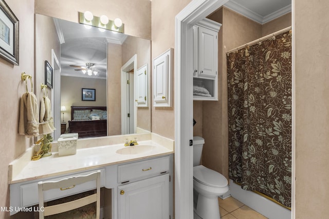 bathroom featuring crown molding, tile patterned floors, vanity, a ceiling fan, and toilet