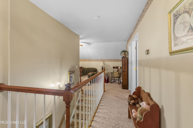 hallway featuring carpet flooring