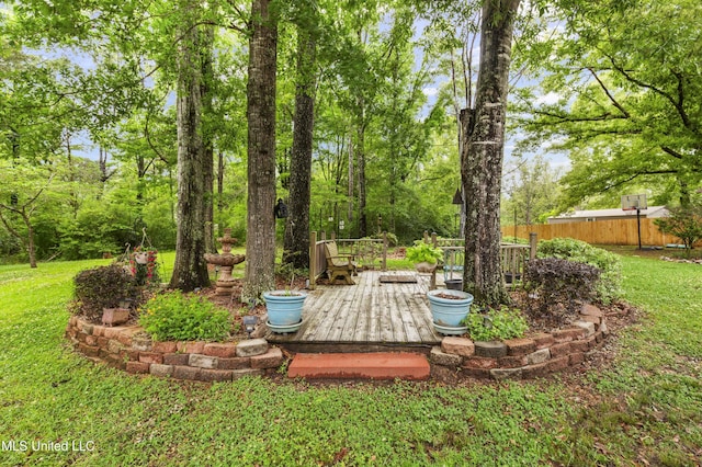 view of yard featuring a wooden deck