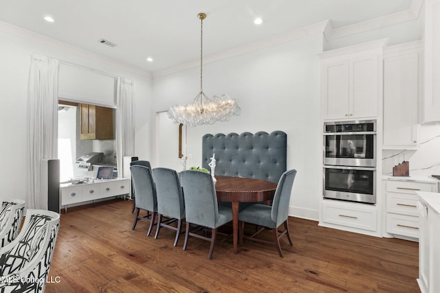 323 Penrose Pl, Madison, MS 39110 - dining area featuring ornamental molding, a chandelier, dark wood-type flooring, and recessed lighting