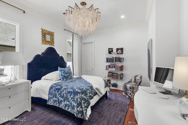 323 Penrose Pl, Madison, MS 39110 - bedroom featuring a chandelier, wood finished floors, and crown molding
