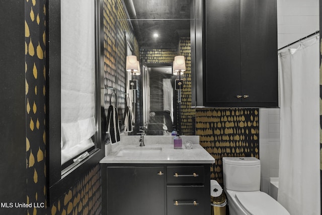 323 Penrose Pl, Madison, MS 39110 - bathroom featuring vanity, toilet, and shower / bath combo with shower curtain