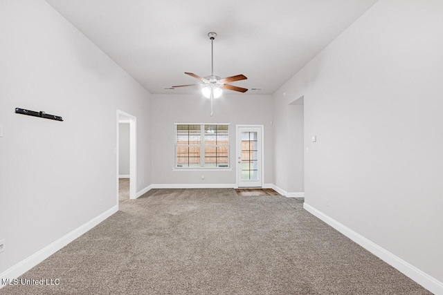 spare room with carpet flooring and ceiling fan