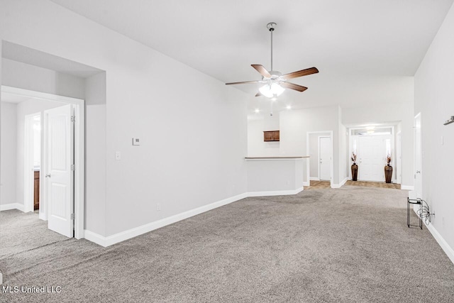 unfurnished living room featuring carpet and ceiling fan