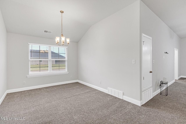 unfurnished room with a chandelier, vaulted ceiling, and carpet floors