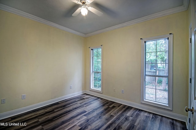 empty room featuring crown molding, dark hardwood / wood-style floors, and ceiling fan