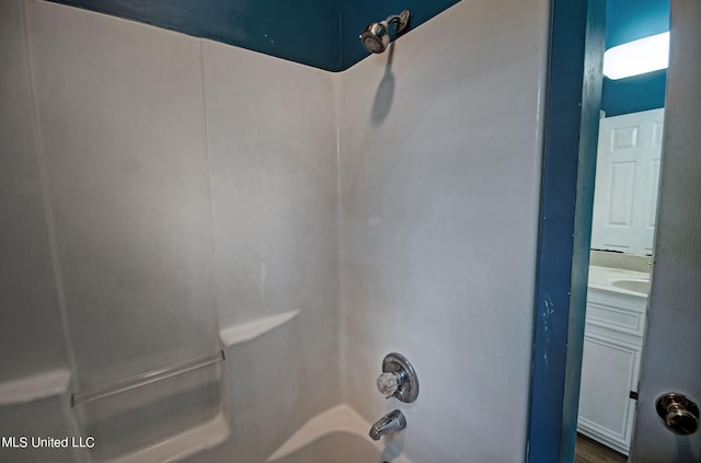 bathroom featuring vanity and shower / bathtub combination