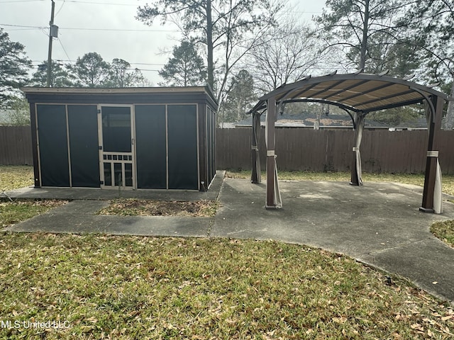 view of yard with a patio area and a shed