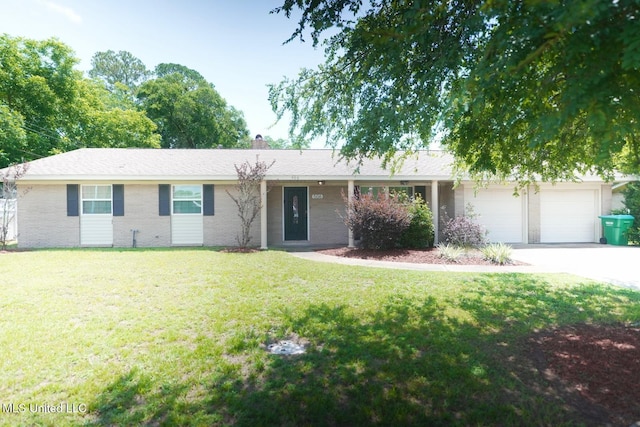 506 Loposser Ave, Gulfport, MS 39507 - ranch-style home featuring a garage, concrete driveway, a front lawn, and brick siding