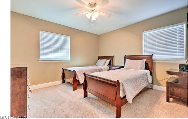 506 Loposser Ave, Gulfport, MS 39507 - carpeted bedroom featuring baseboards and a ceiling fan