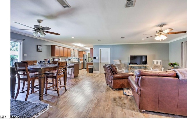 506 Loposser Ave, Gulfport, MS 39507 - living room featuring ceiling fan, crown molding, light wood-type flooring, and recessed lighting