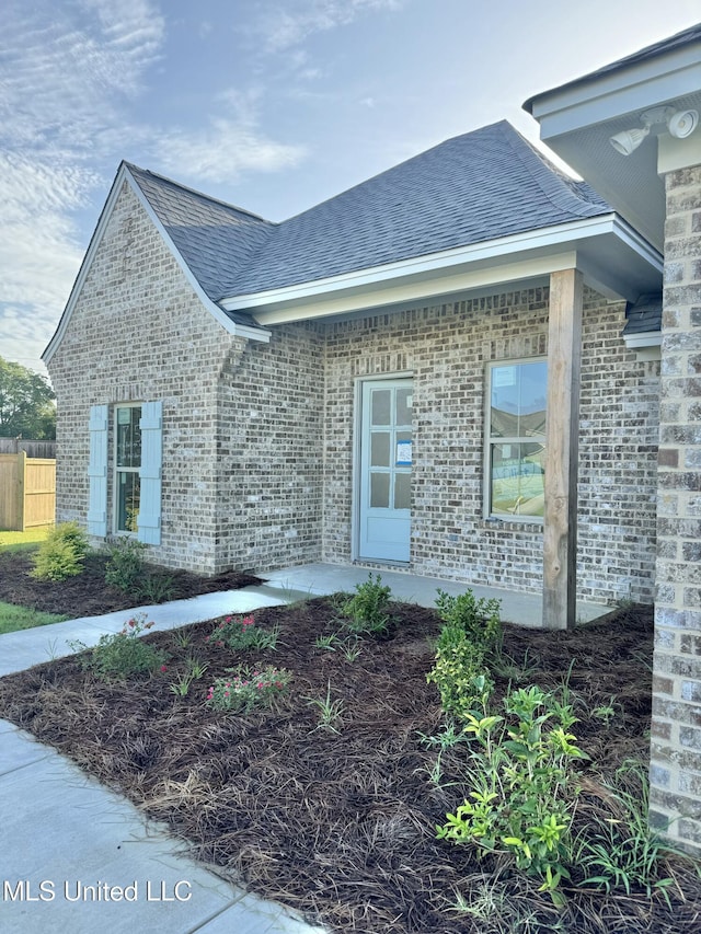 412 Baleigh Way, Canton, MS 39046 - view of front of house with brick siding and a shingled roof