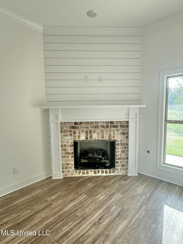 412 Baleigh Way, Canton, MS 39046 - detailed view of a fireplace, crown molding, and wood finished floors