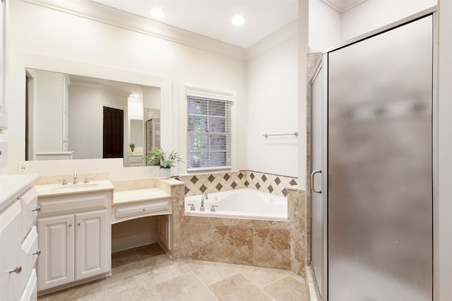 bathroom with vanity, ornamental molding, and shower with separate bathtub