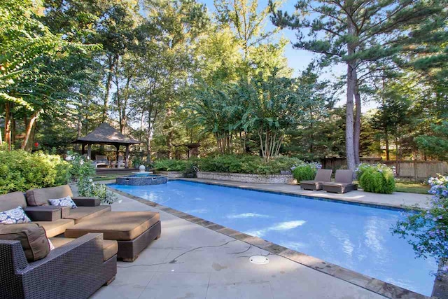 view of swimming pool featuring a gazebo and an outdoor hangout area