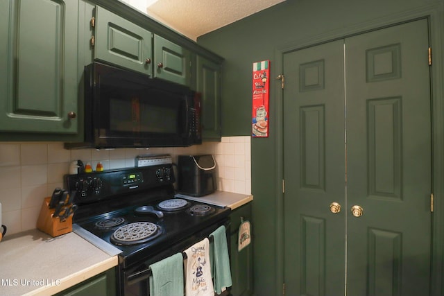 kitchen featuring green cabinetry, black appliances, light countertops, a textured ceiling, and backsplash