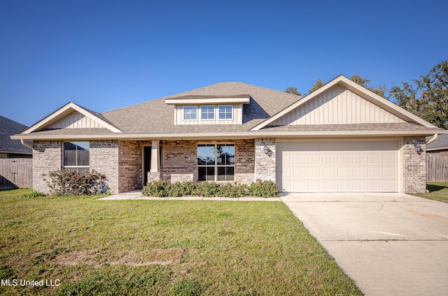 view of front facade featuring driveway, brick siding, roof with shingles, and a front yard