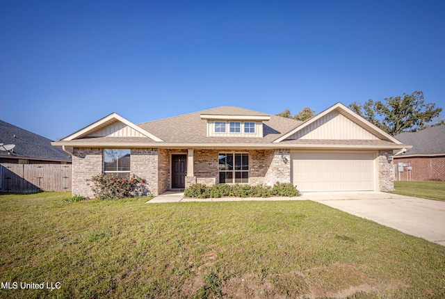 view of front of house featuring a garage, a front yard, driveway, and fence