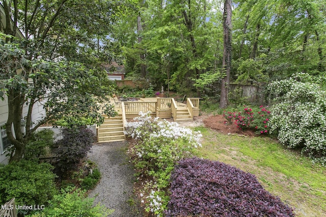 view of yard with a wooden deck