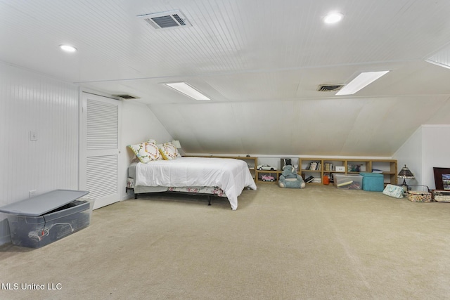 bedroom with carpet and lofted ceiling