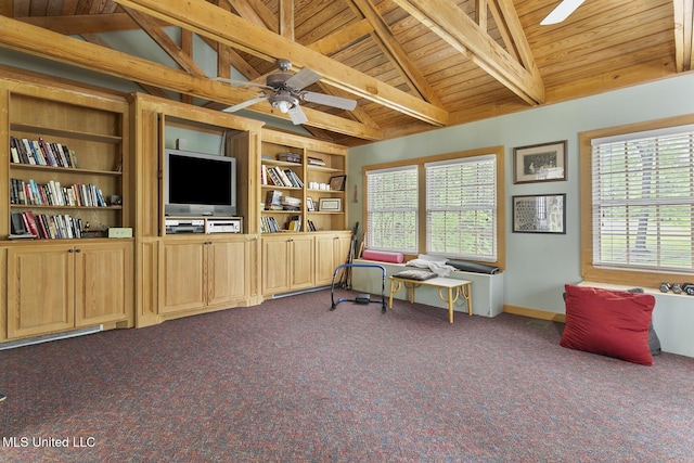 living area with vaulted ceiling with beams, ceiling fan, carpet flooring, and wooden ceiling