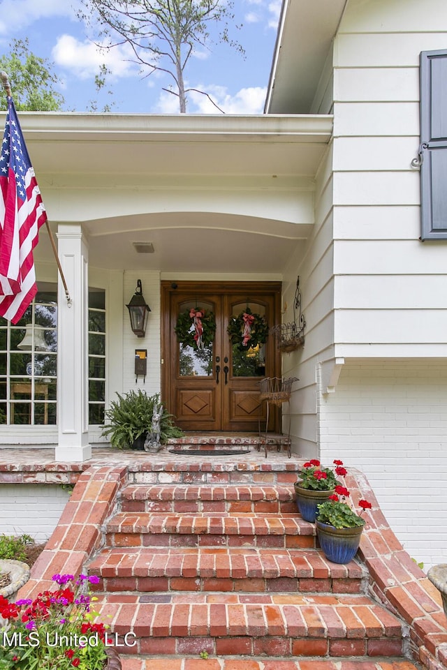 doorway to property with french doors