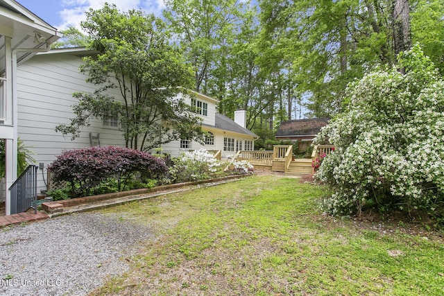 view of yard featuring a deck