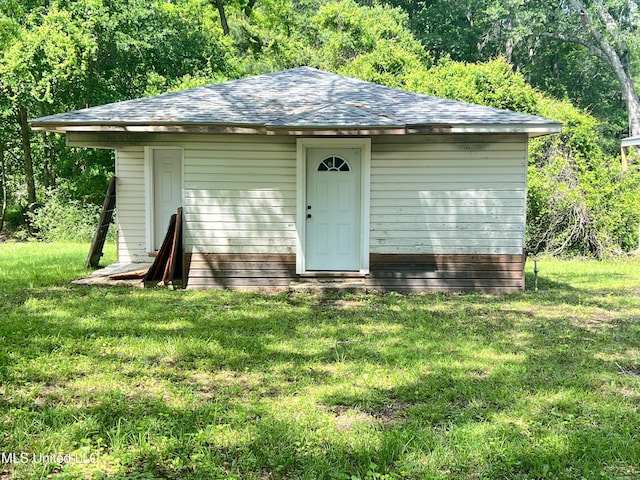 TBD N Critz St, Wiggins, MS 39577 - view of front of property featuring a front lawn and roof with shingles