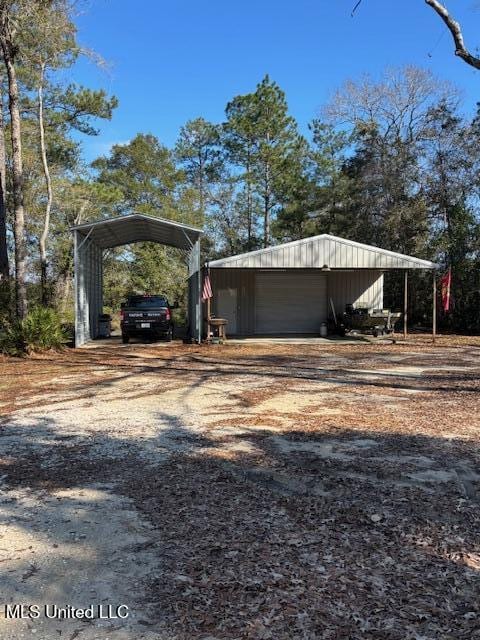 exterior space featuring a carport