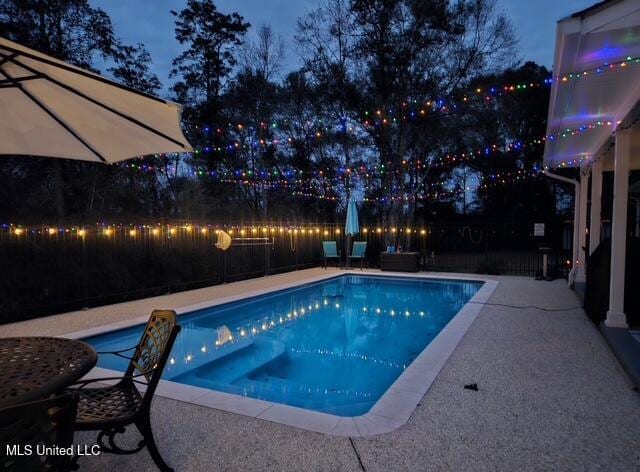 view of pool with a patio