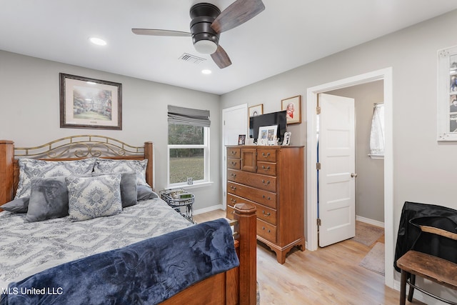 bedroom featuring ceiling fan and light wood-type flooring