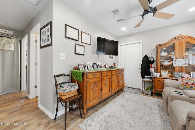 interior space featuring light hardwood / wood-style floors and ceiling fan