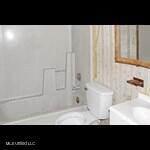 205 Shalimar Dr, Long Beach, MS 39560 - full bath with toilet, vanity, and tub / shower combination