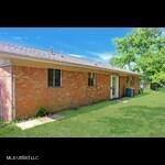 205 Shalimar Dr, Long Beach, MS 39560 - back of house with a lawn