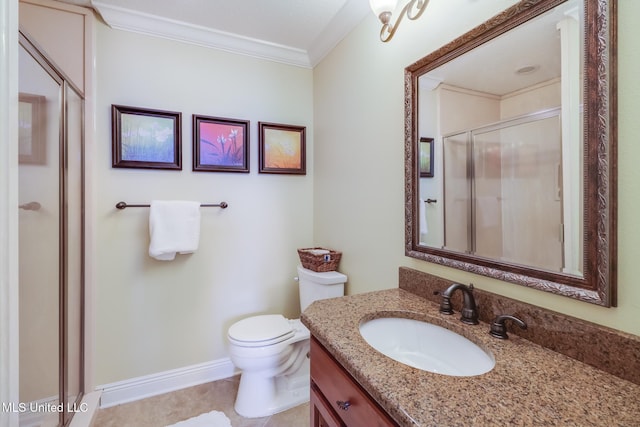 bathroom with ornamental molding, toilet, a shower with shower door, and vanity