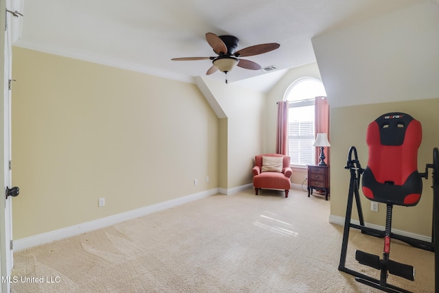 living area with lofted ceiling, carpet floors, and ceiling fan