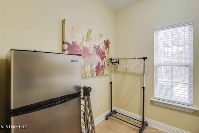 interior space with a healthy amount of sunlight and tile patterned floors