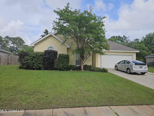 view of front of property featuring a garage, fence, concrete driveway, and a front lawn