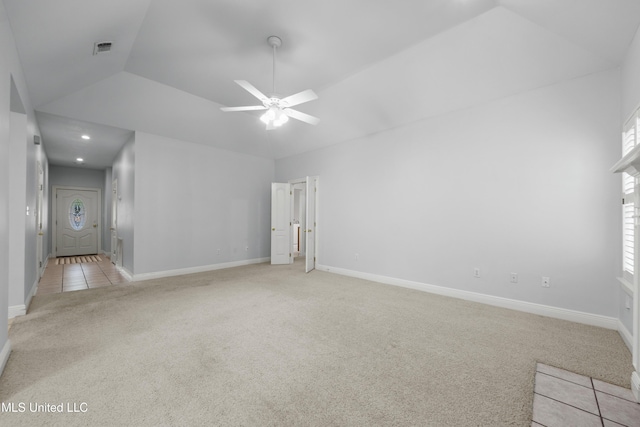 725 Old Savannah Dr, Long Beach, MS 39560 - empty room with light colored carpet, vaulted ceiling, a ceiling fan, and baseboards