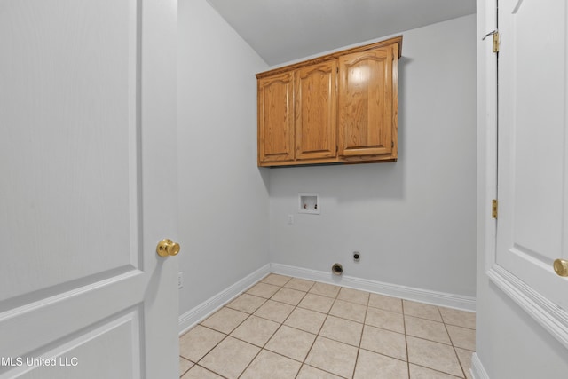 725 Old Savannah Dr, Long Beach, MS 39560 - laundry room featuring hookup for a washing machine, cabinet space, light tile patterned floors, baseboards, and hookup for an electric dryer