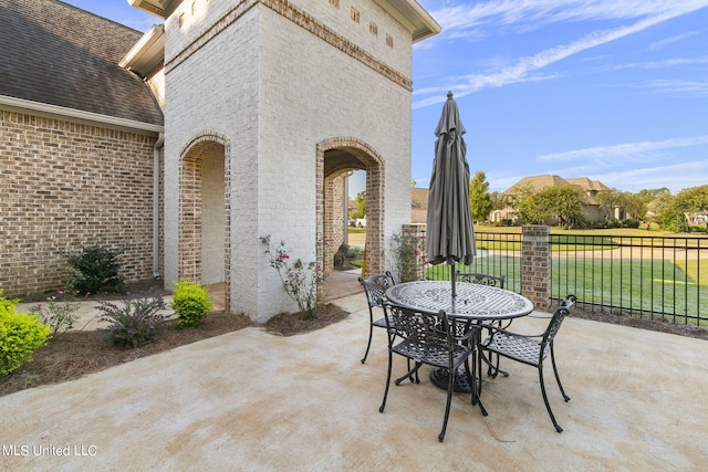 213 Ironwood Plantation Blvd, Madison, MS 39110 - view of patio with outdoor dining area and fence