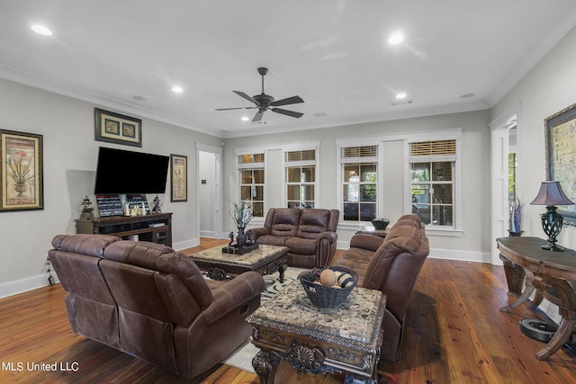 living room with dark wood-type flooring, ceiling fan, and ornamental molding