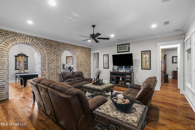 living room featuring crown molding, dark hardwood / wood-style floors, and billiards