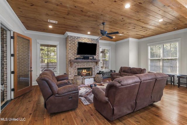 213 Ironwood Plantation Blvd, Madison, MS 39110 - living area featuring wooden ceiling, ornamental molding, a fireplace, and visible vents